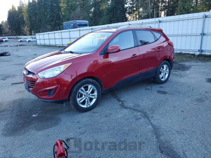 Hyundai Tucson 2011 VIN KM8JUCAC2BU271751