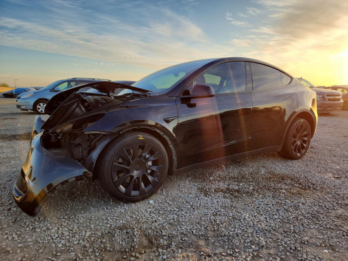 Tesla Model y 2023 VIN 7SAYGDEE0PF621117