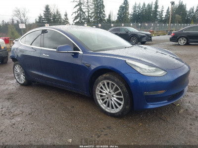 Tesla Model 3 2018 5YJ3E1EB7JF063582