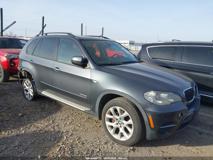 BMW X5 2012 VIN 5UXZV4C53CL990909