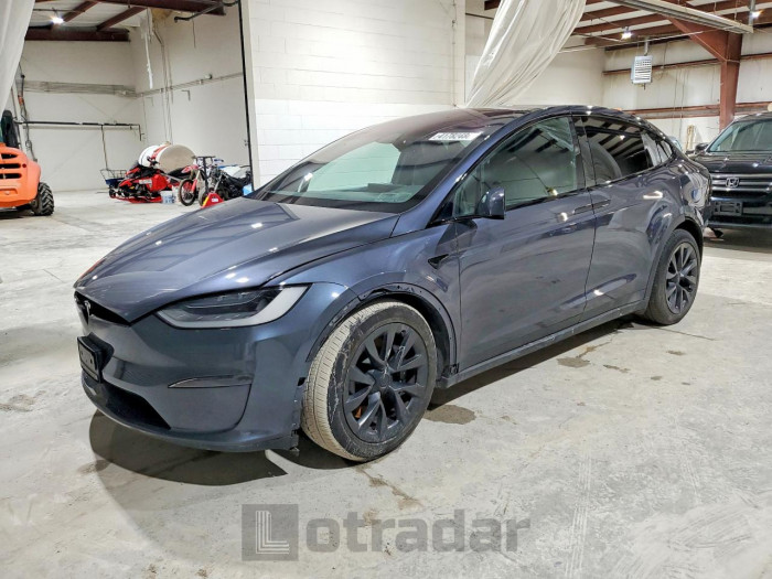 Tesla  2023 VIN 7SAXCAE58PF389582