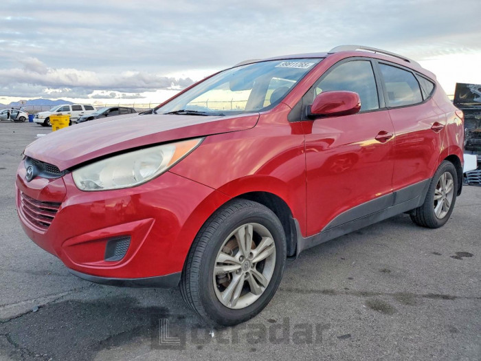 Hyundai Tucson 2011 VIN KM8JUCAC9BU218058