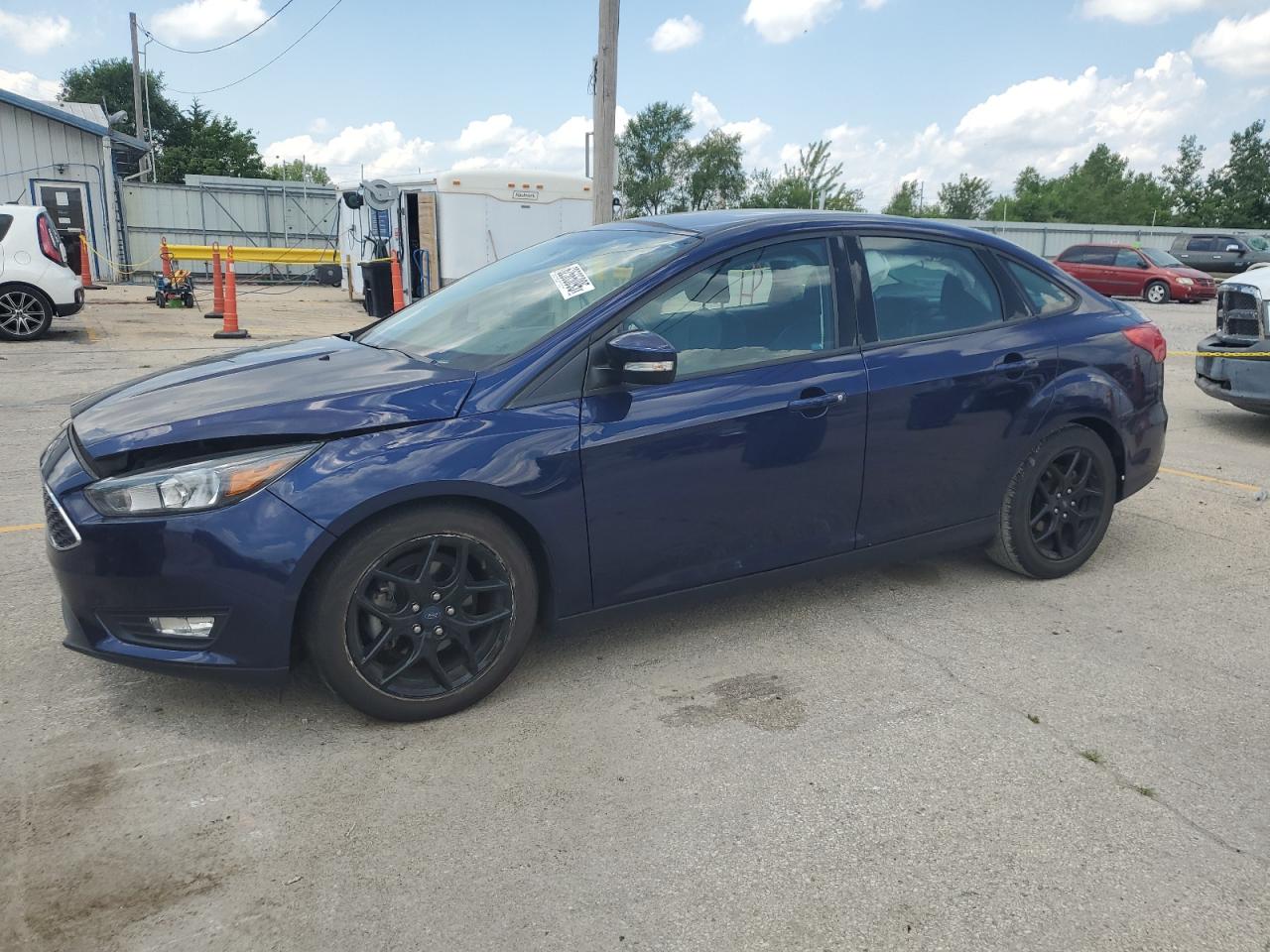 FORD FOCUS 2016 1FADP3F23GL288232